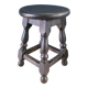 Antique wooden stool with turned legs.