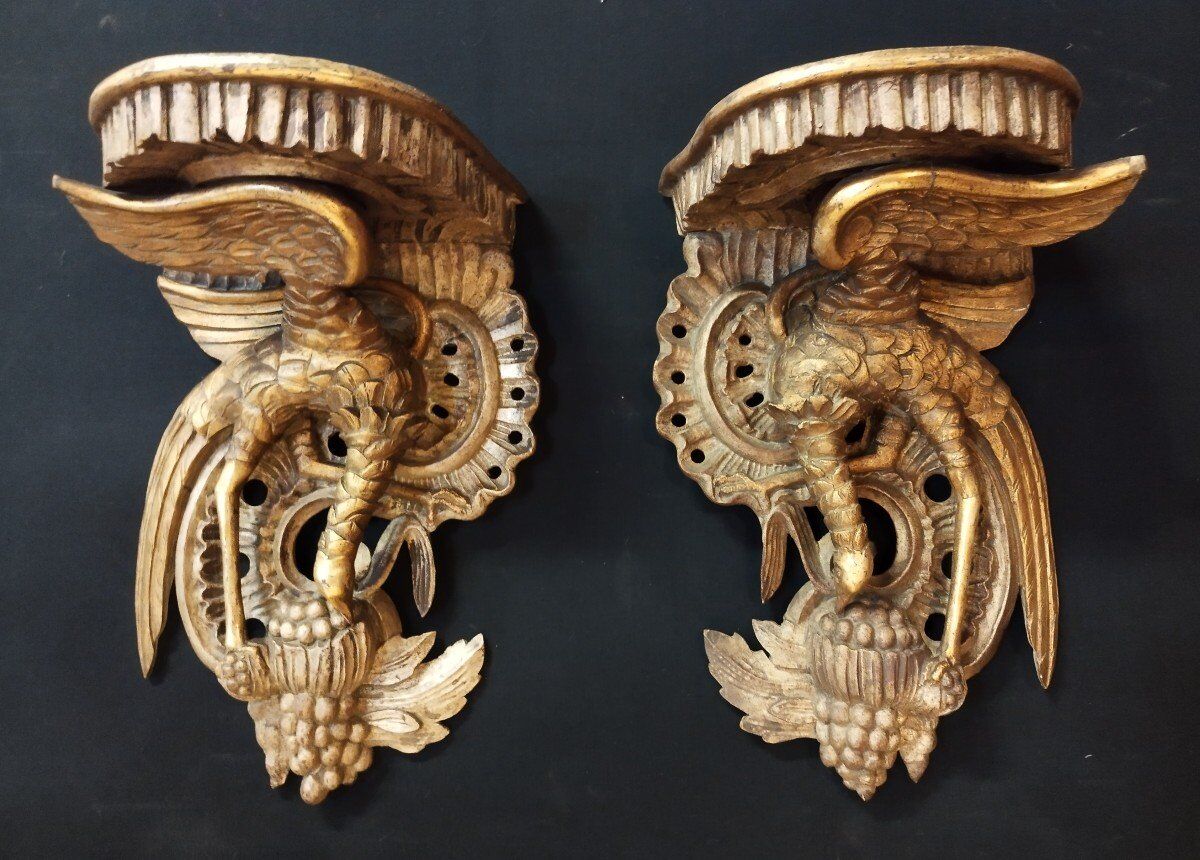 Pair of polychromed wooden wall mounts