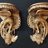 Pair of polychromed wooden wall mounts