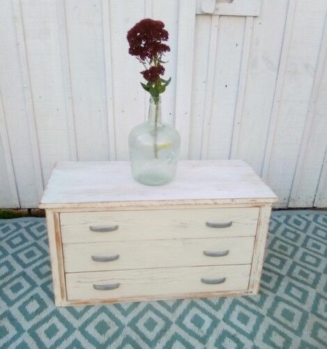 White patina low wooden commodity