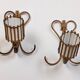 Rattan wall lights by Louis Sognot