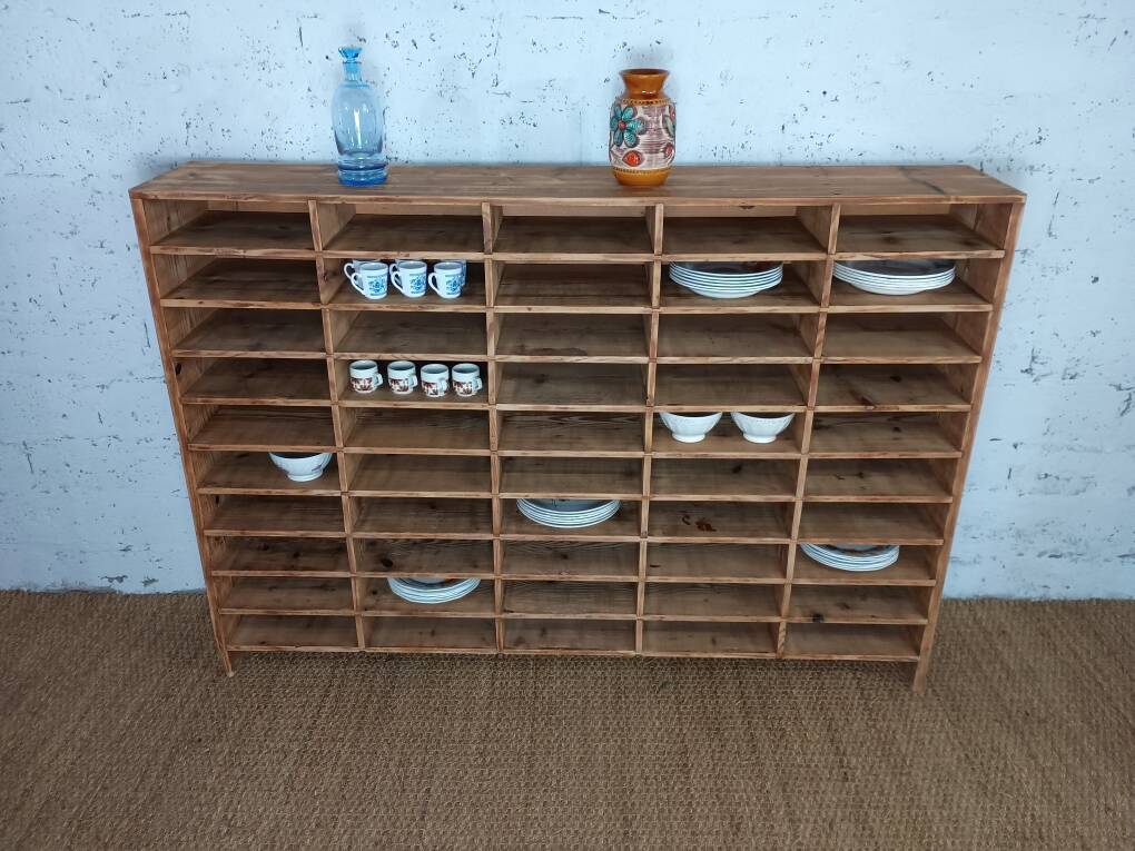 Wooden sorting cabinet with 50 compartments.