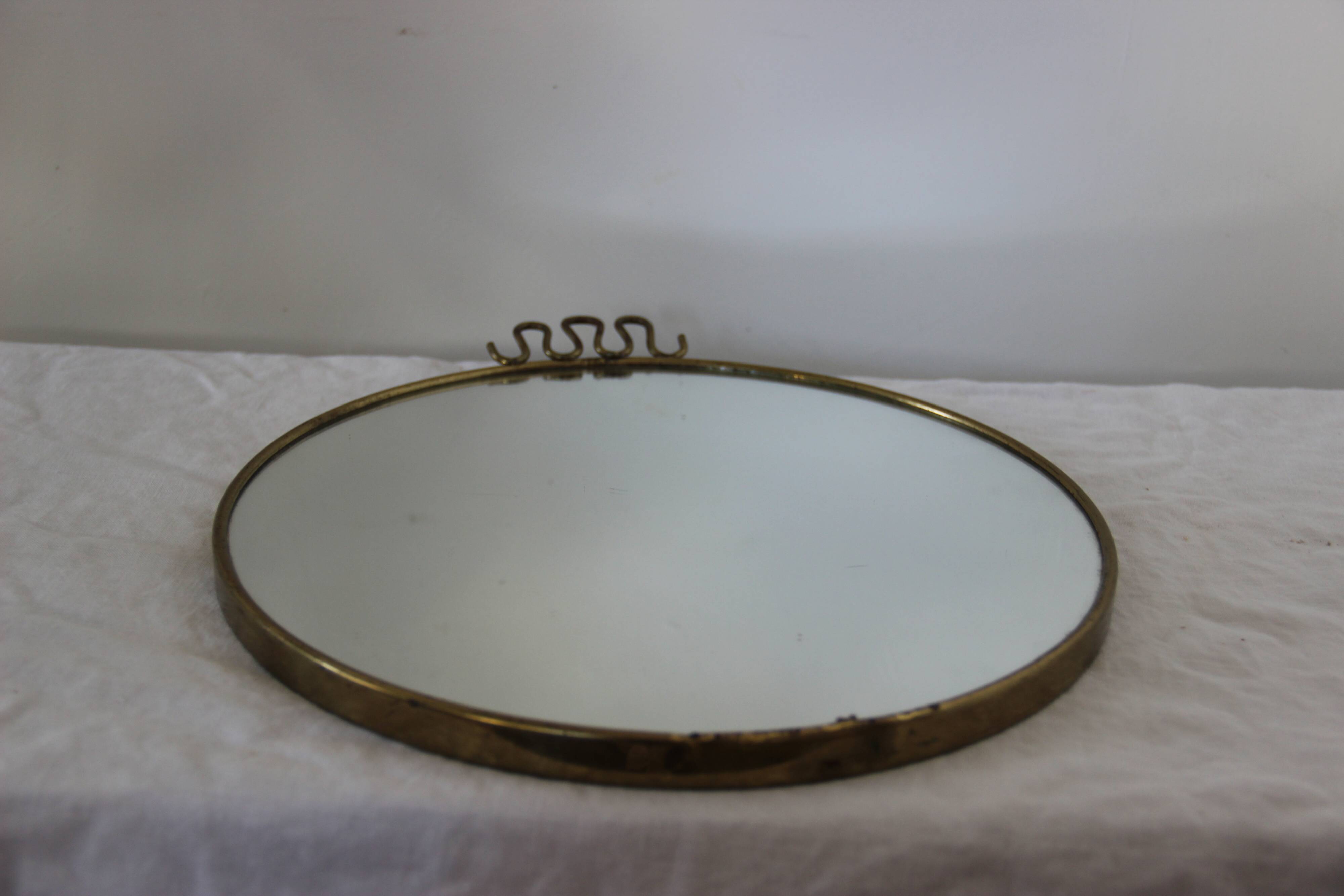round brass mirror