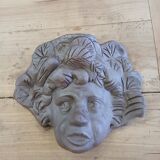 Child's face sculpture