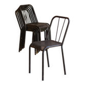 Set of 6 metal garden chairs with perforated seats.