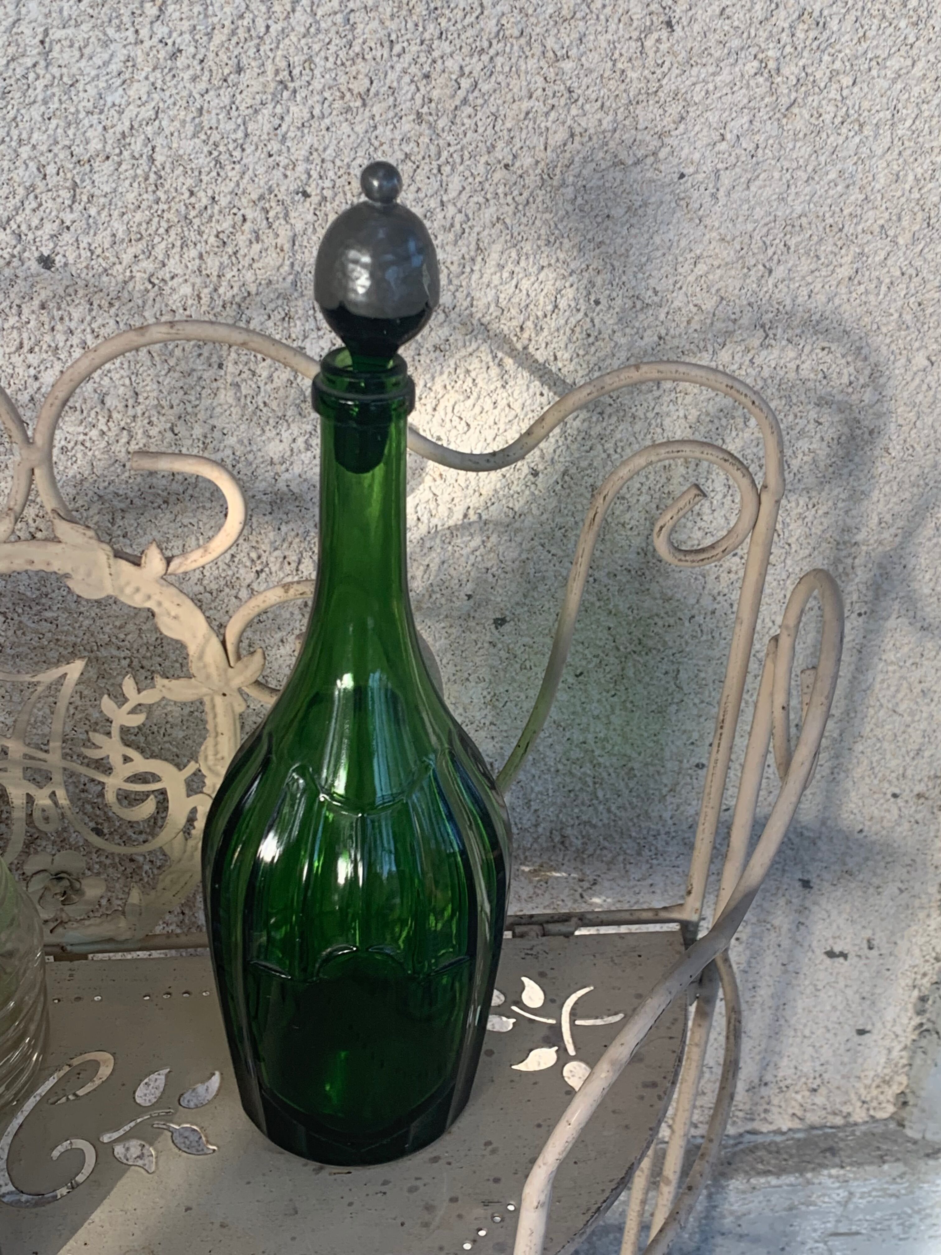 Bottle, green glass bottle green stopper and antique pewter