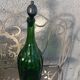 Bottle, green glass bottle green stopper and antique pewter