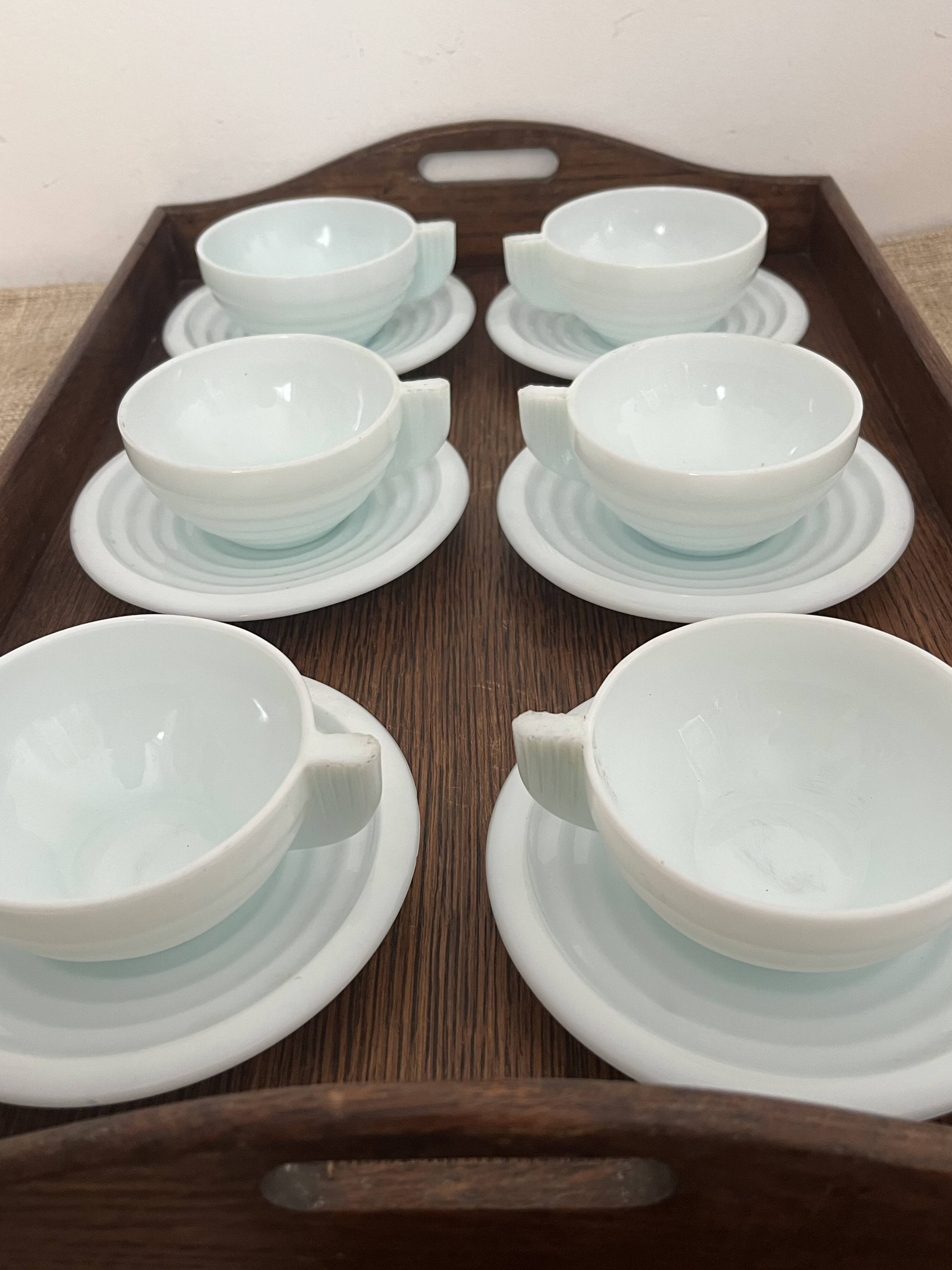 Set of 6 opaline Art Deco cups and 6 saucers.