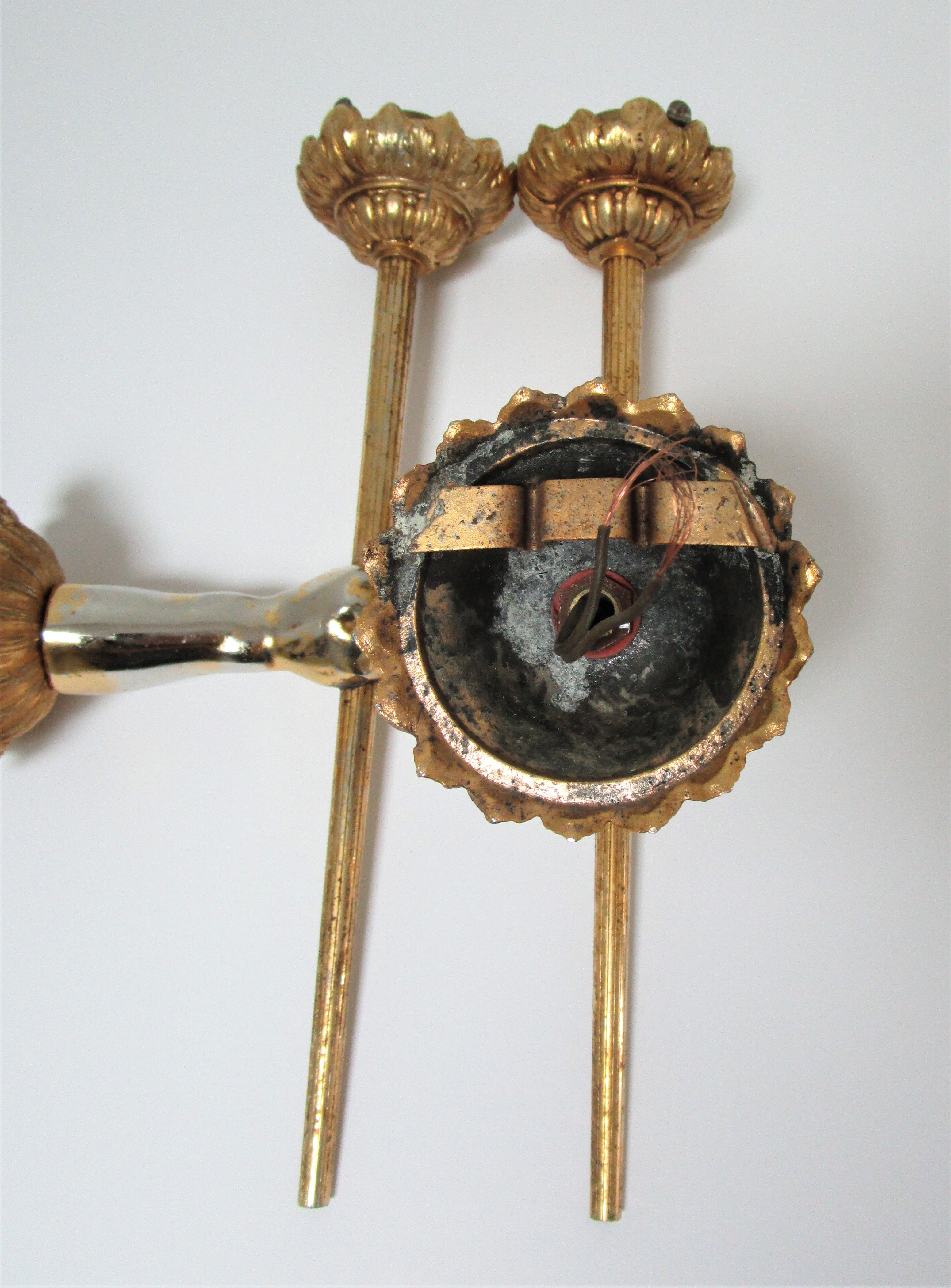 Pair of vintage patinated golden metal hand sconces