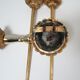 Pair of vintage patinated golden metal hand sconces