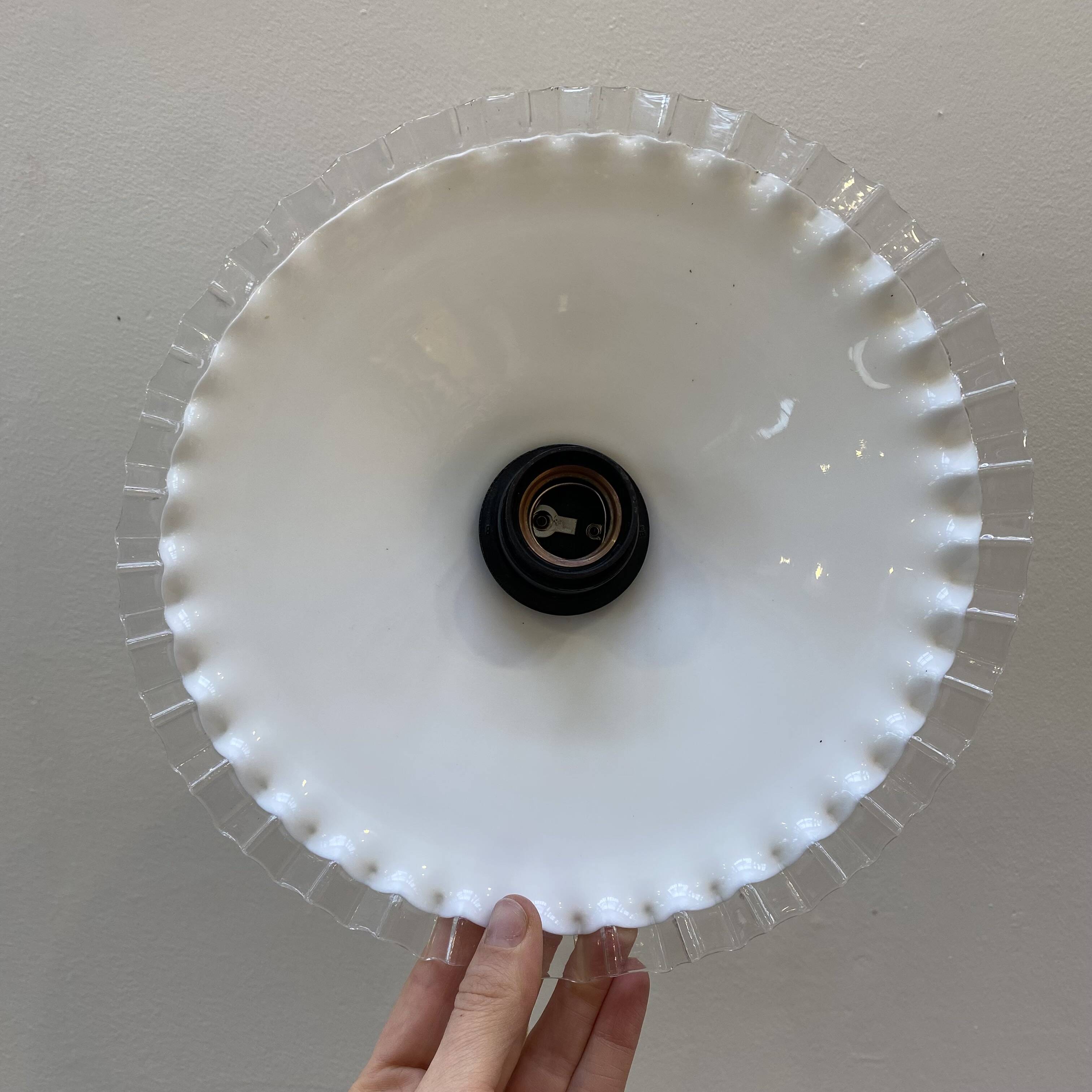 White opaline pendant light with transparent serrated edges