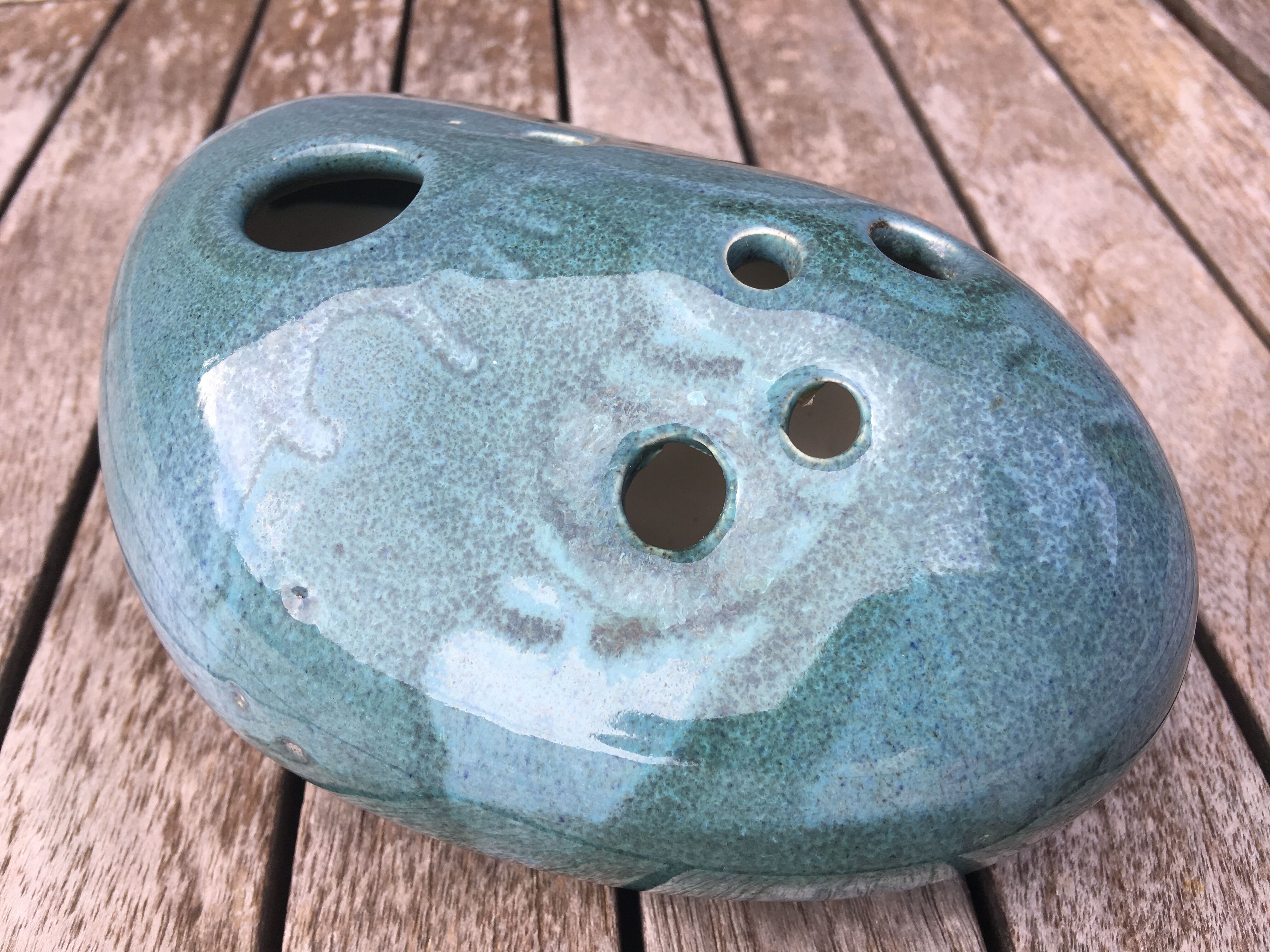 Roller spike flowers, blue-green ceramics