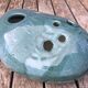 Roller spike flowers, blue-green ceramics