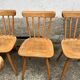 Set of 8 vintage bistro chairs – Warm stained wood – Compass legs