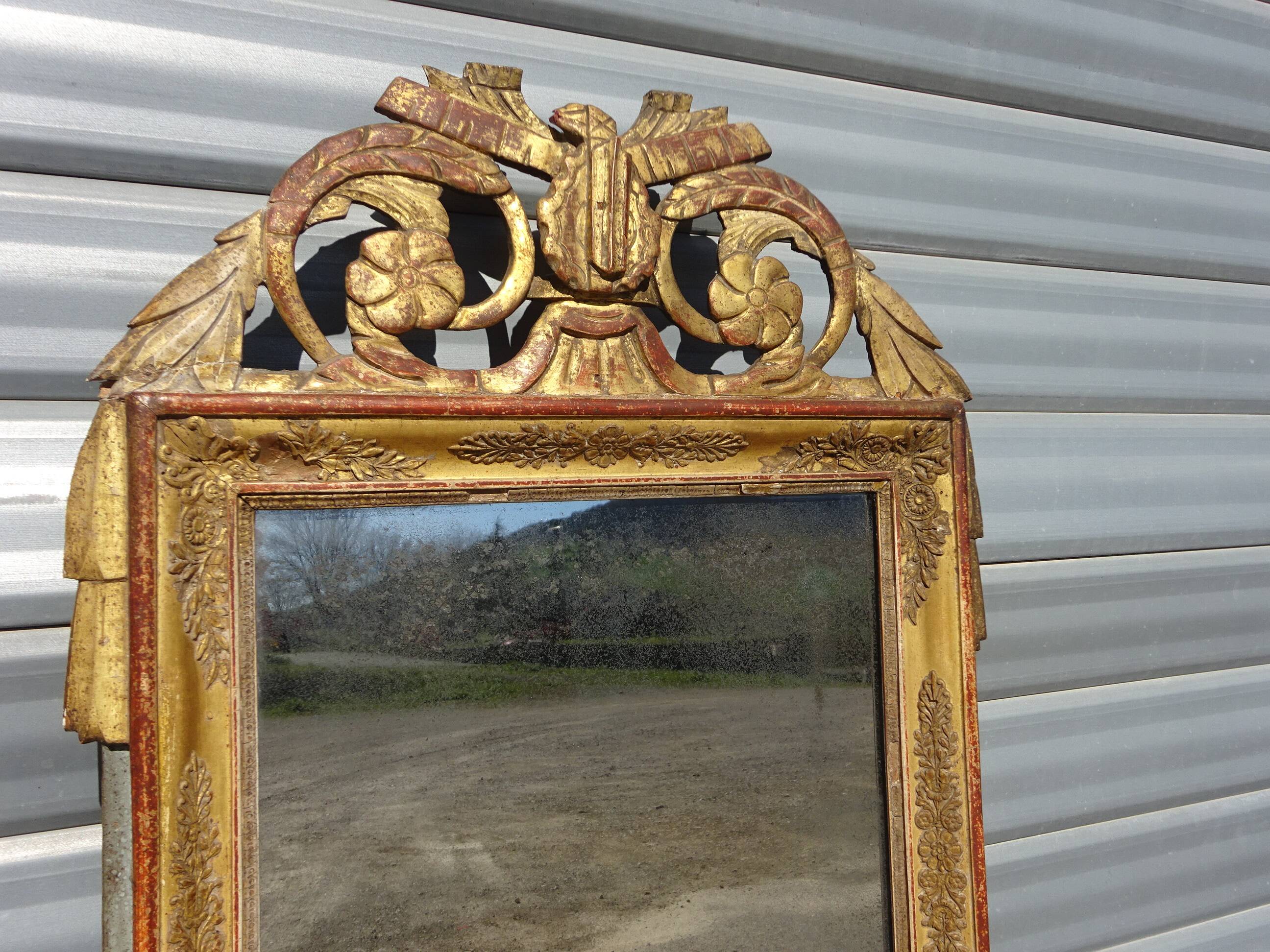 Very old Louis XVI style mirror.