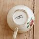 Antique ironstone coffee cup, patinated Sarreguemines – Floral decoration