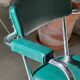 Pair of green vinyl and chrome armchairs, mid-century