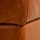 Ottoman with leather upholstery