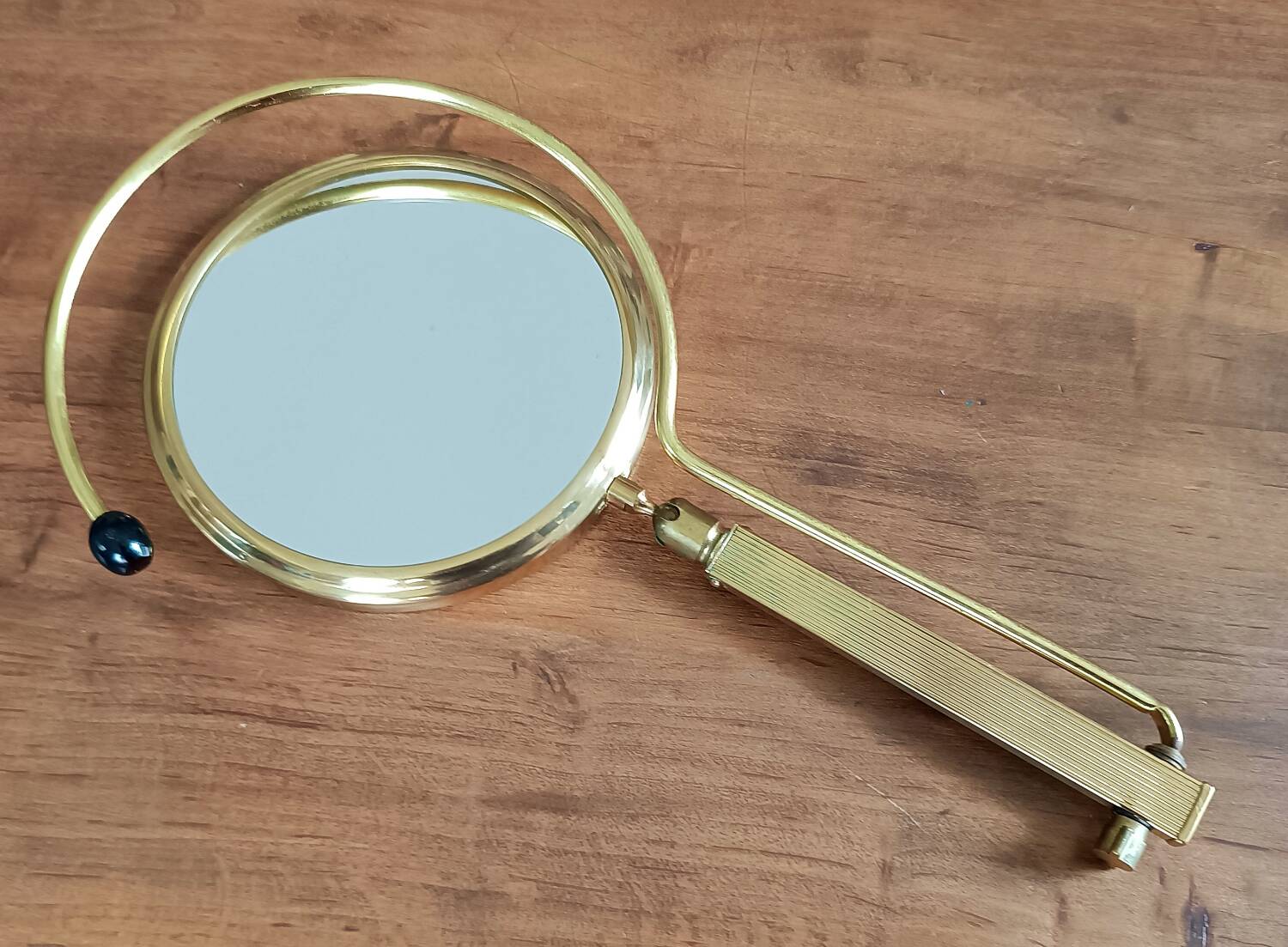 Vintage midi century brass barber mirror