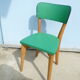 Chair vintage in green leatherette