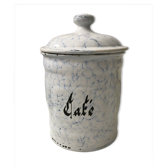 Vintage coffee pot in white enamelled iron and blue retro kitchen decoration