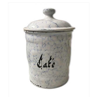 Vintage coffee pot in white enamelled iron and blue retro kitchen decoration