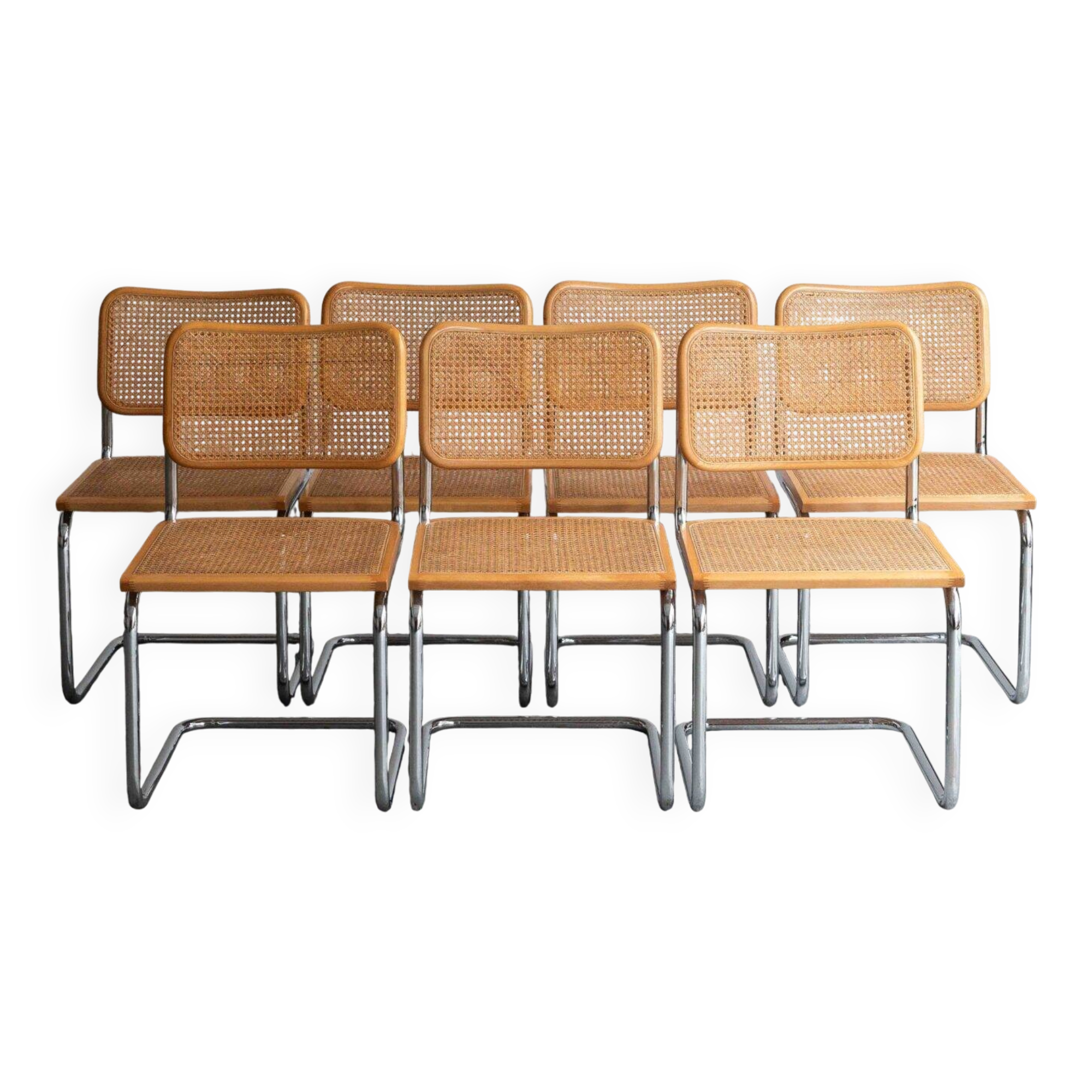 Set of 7 'Cesca' dining chairs by Marcel Breuer.