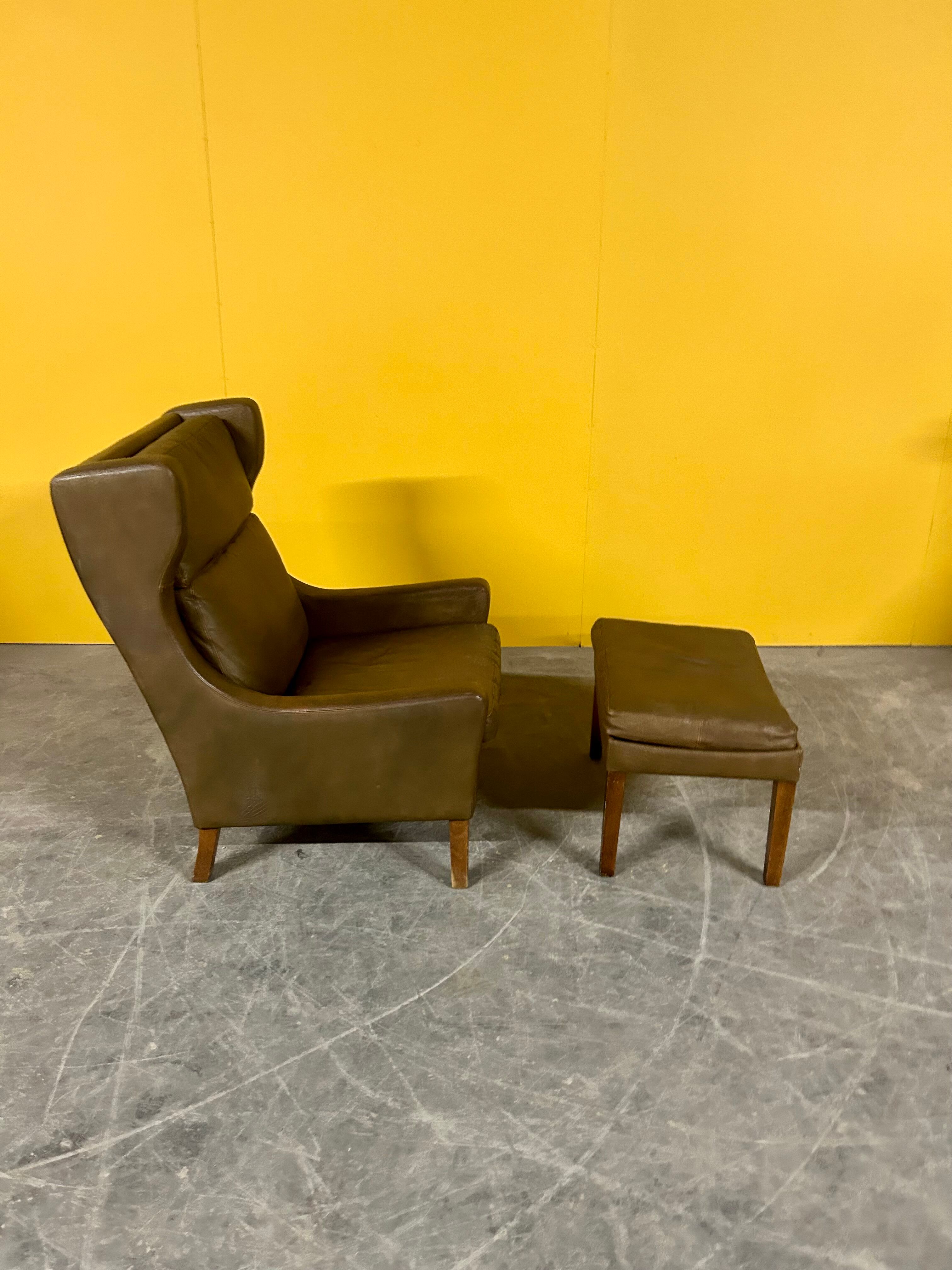 Fauteuil en cuir vintage danois à dossier haut années 1960