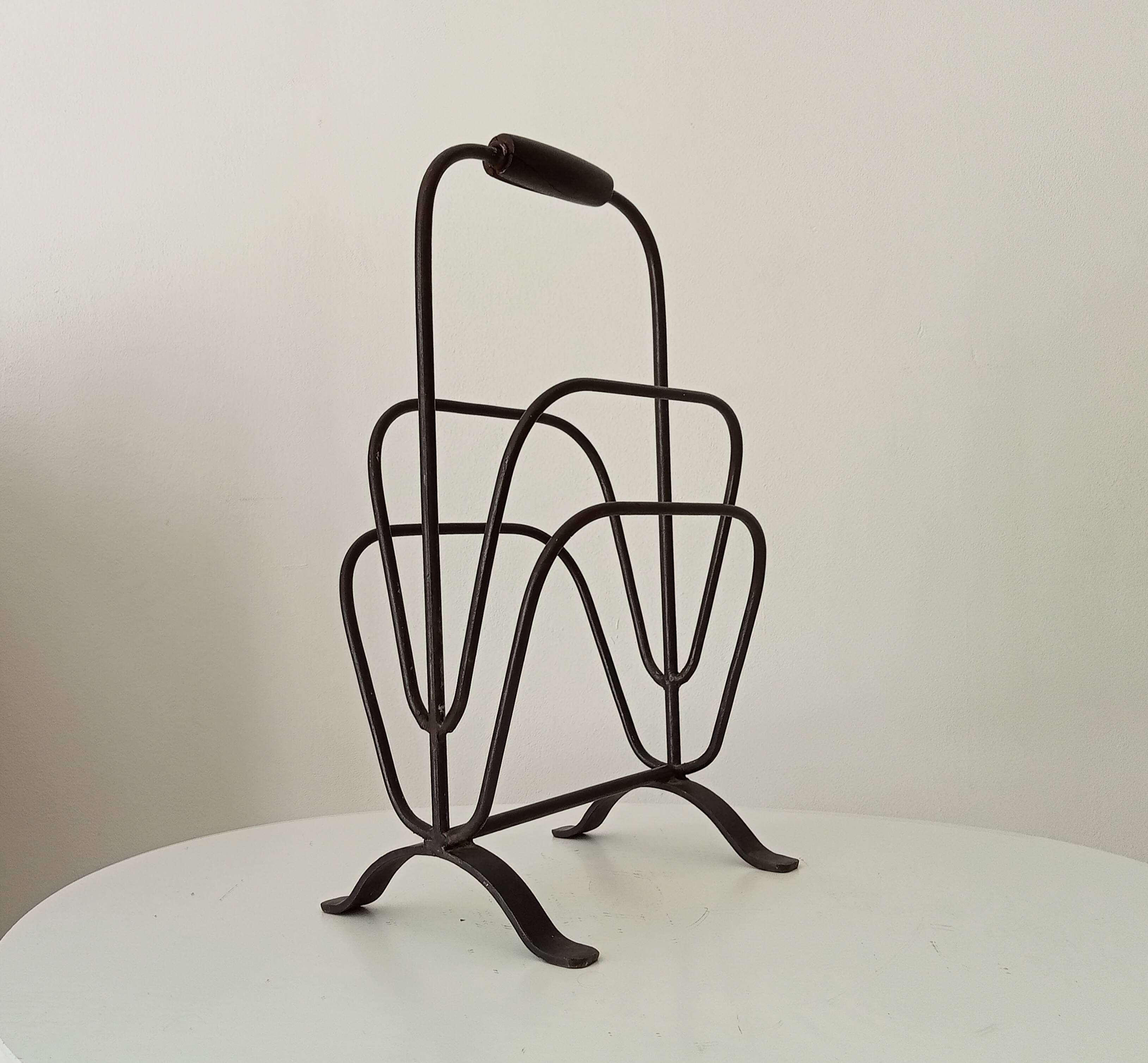 Brutalist wrought iron magazine rack from the 1960s.