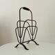 Brutalist wrought iron magazine rack from the 1960s.