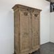 Armoire normande décapée richement sculptée
