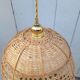 Openwork rattan suspension
