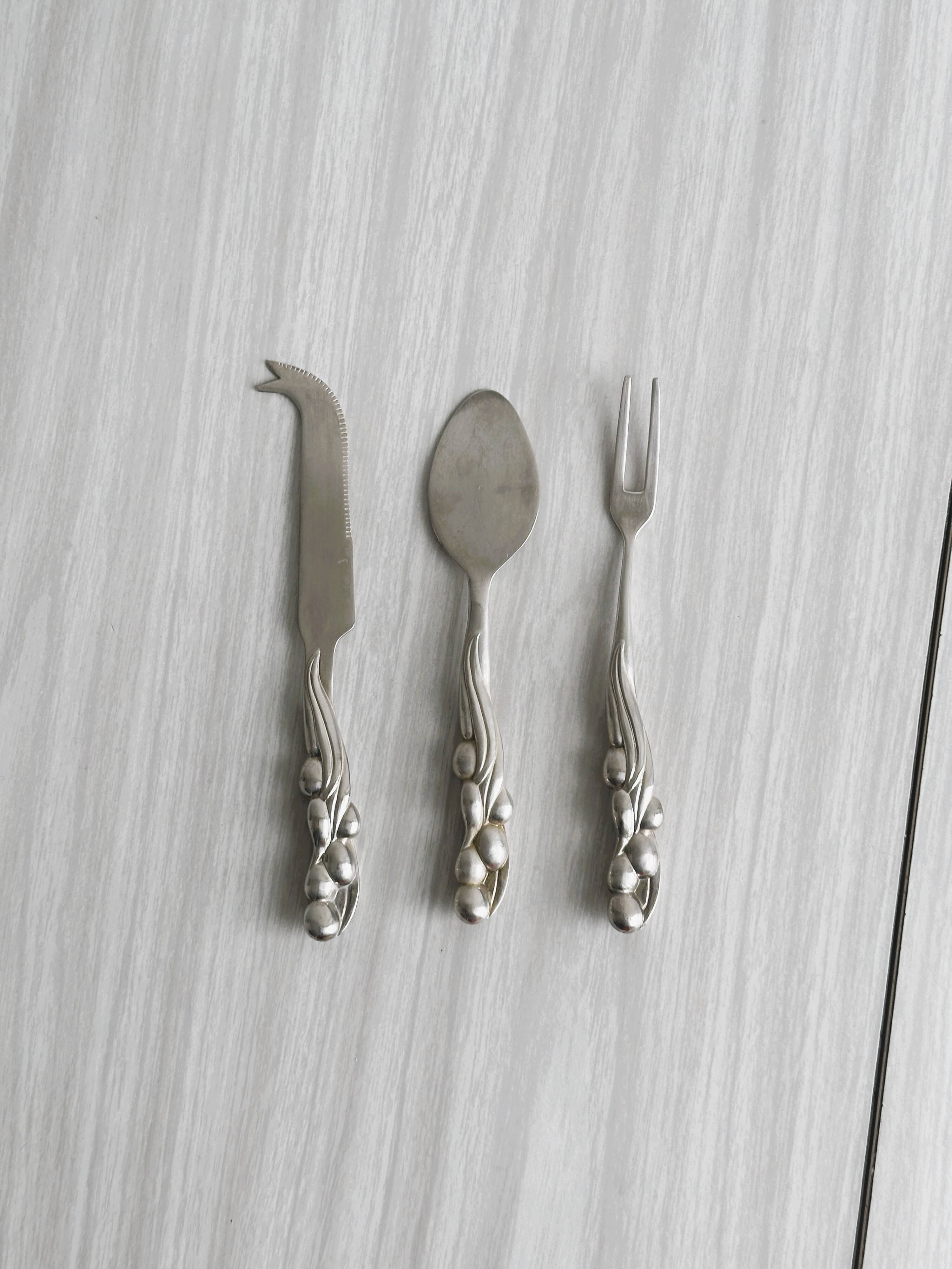 Antique cheese cutlery set