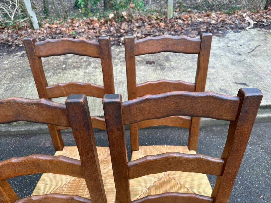 4 dining chairs made of solid wood with straw seats, farmhouse style, medium oak, 20th century, 110cm.