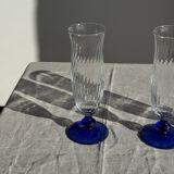 Set of 6 blue-footed champagne flutes; 3 pairs of designs.