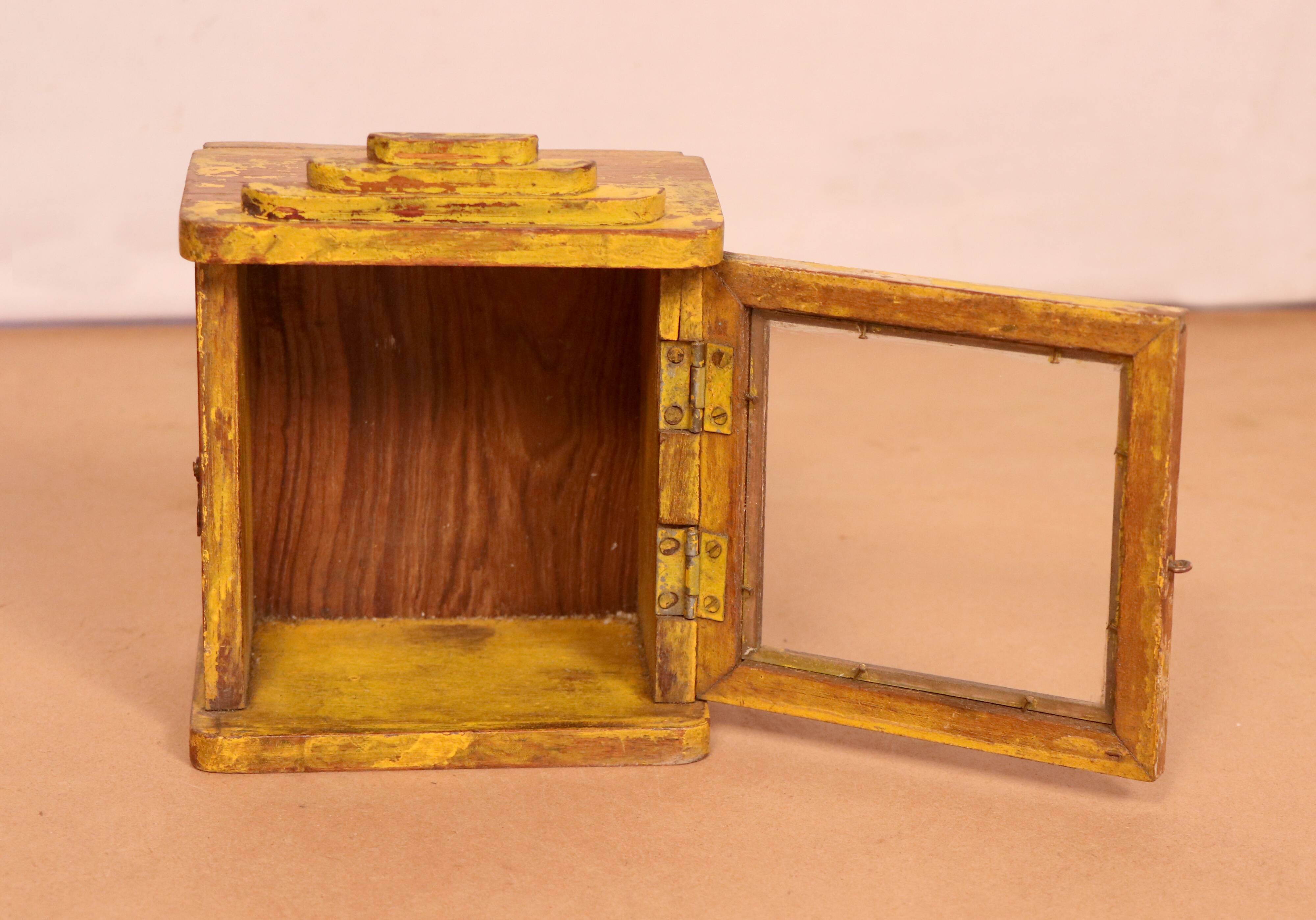 Old art deco wall showcase in original yellow teak