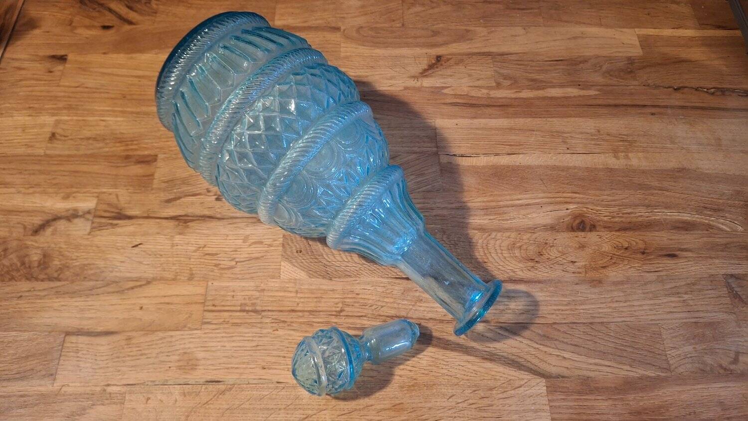 Pair of cut blown glass carafes in blue-green from the 19th century.