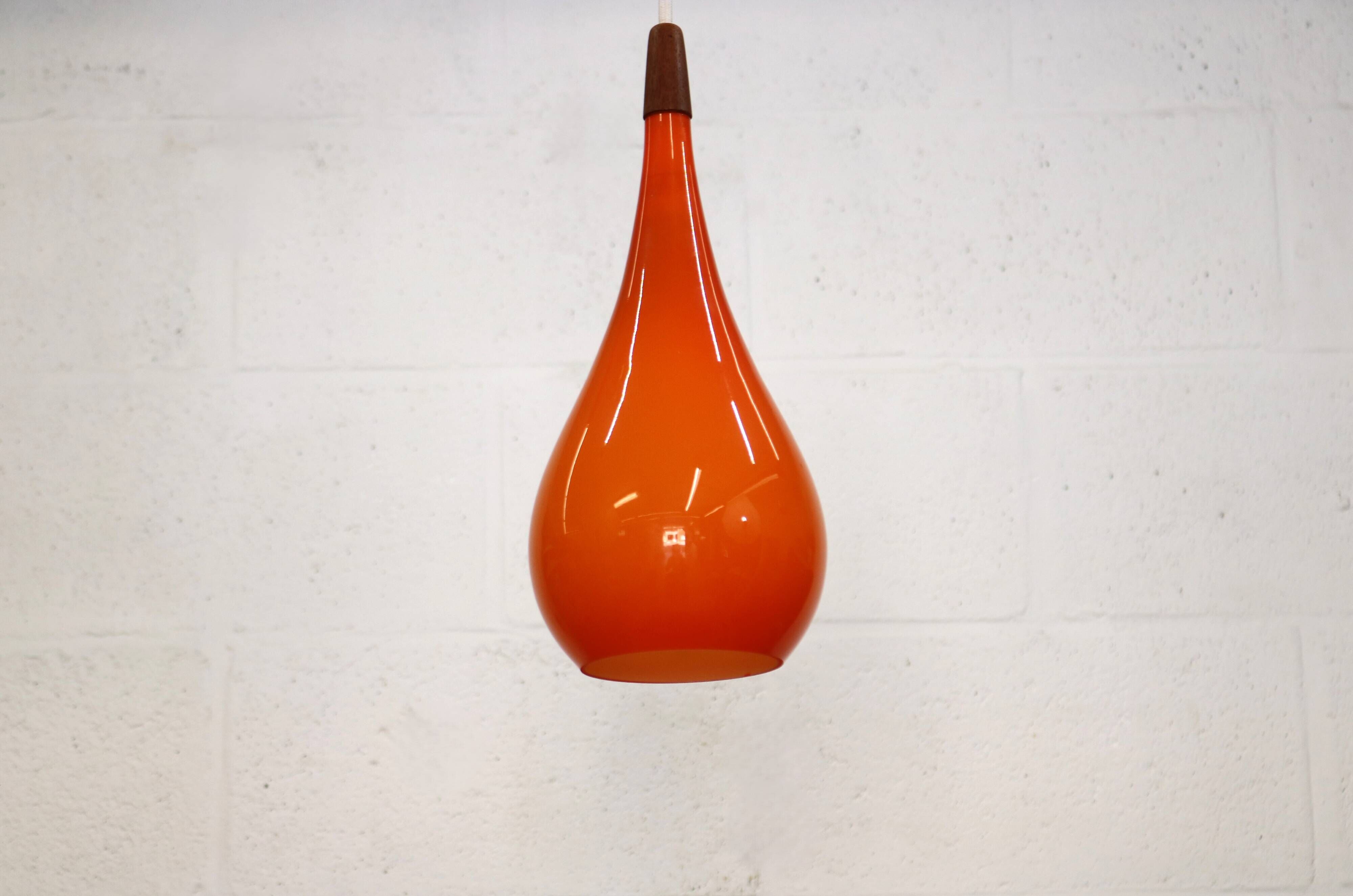 Orange teardrop glass pendant lamp made by Holmegaard - Denmark 1960