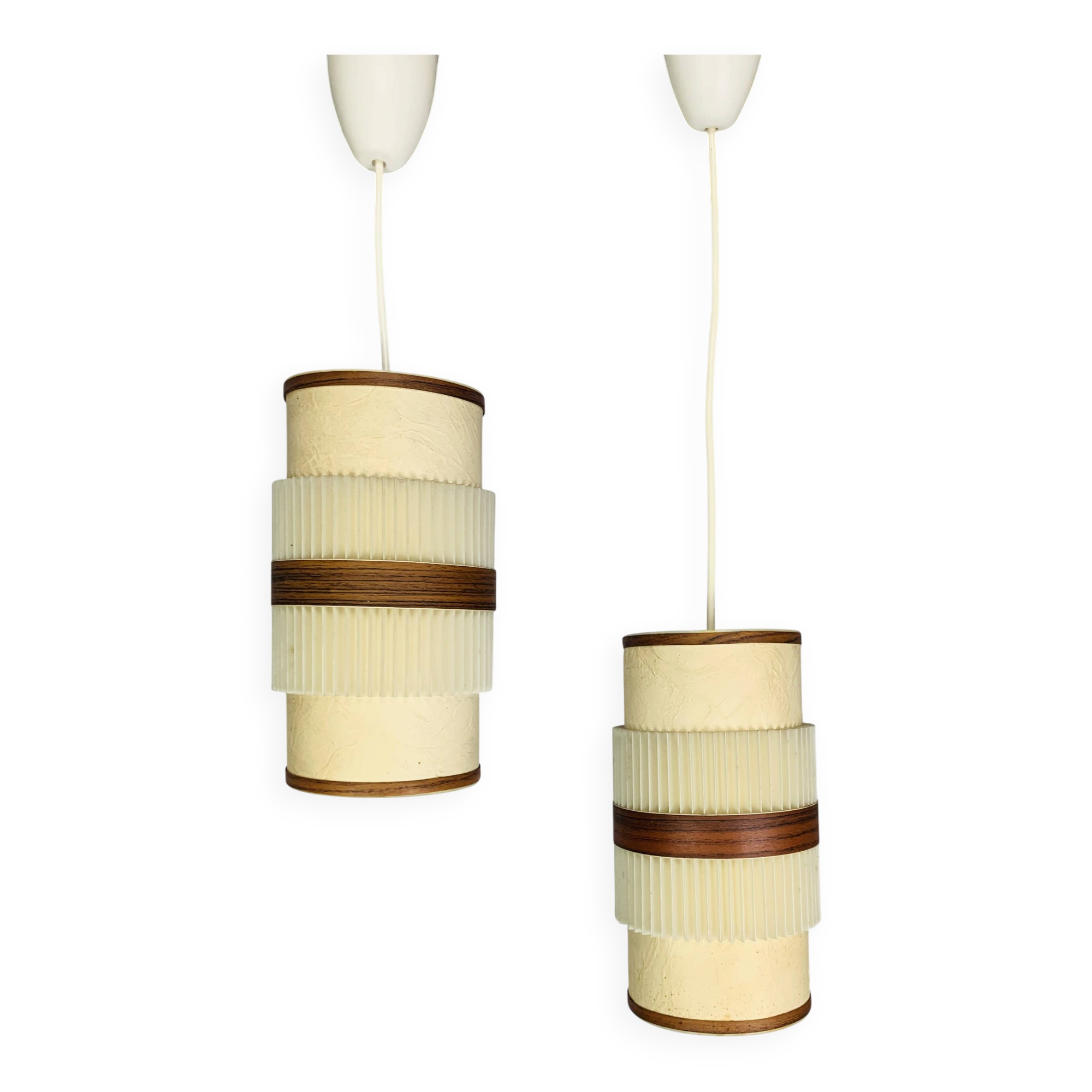 Pair of roller suspensions from the 70s, paper