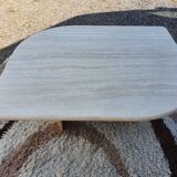 Adjustable travertine coffee table eye shape