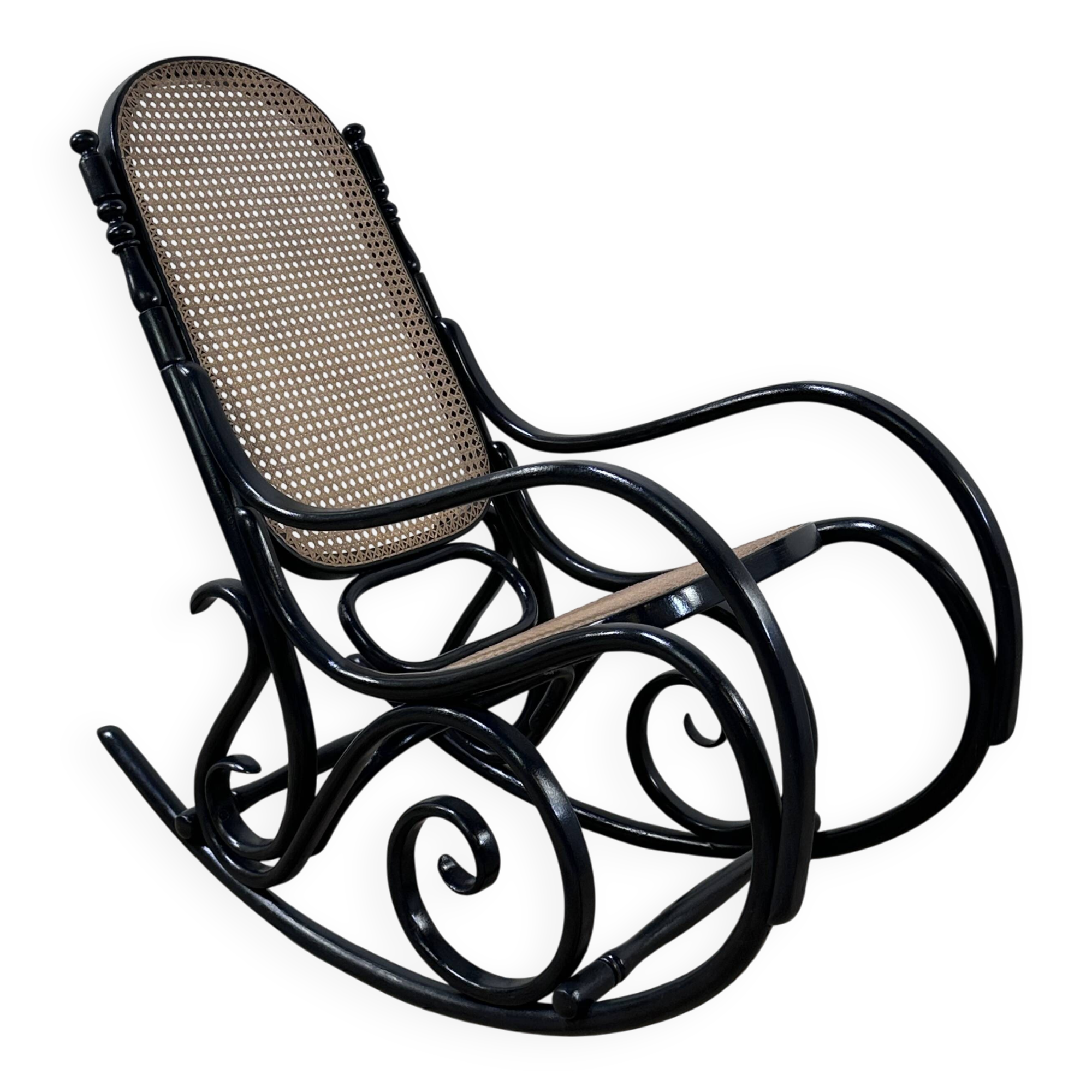 Rocking-chair en bois courbé noirci et cannage années 1900