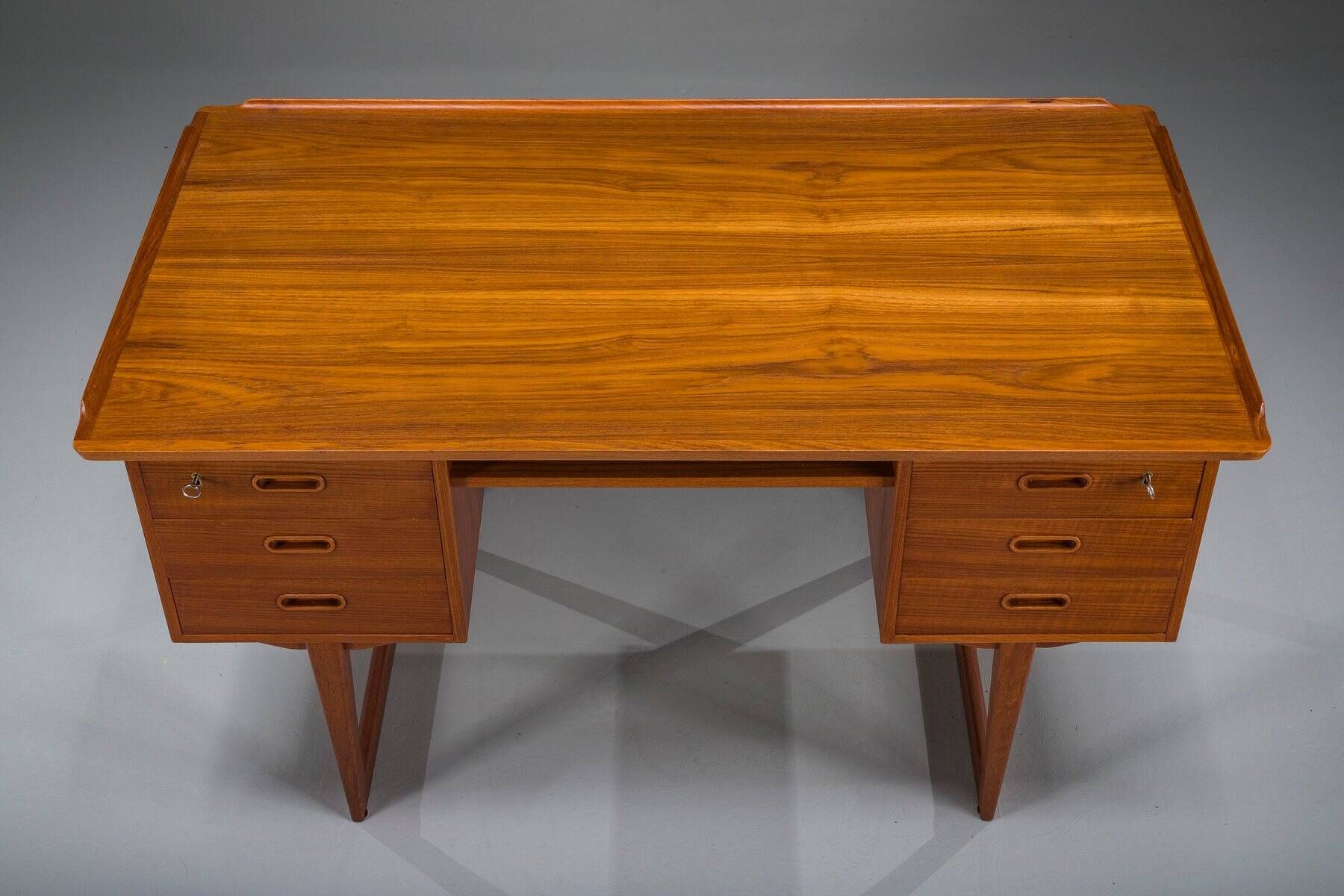 Mid-century Danish freestanding teak desk with raised lip edge, 1960s