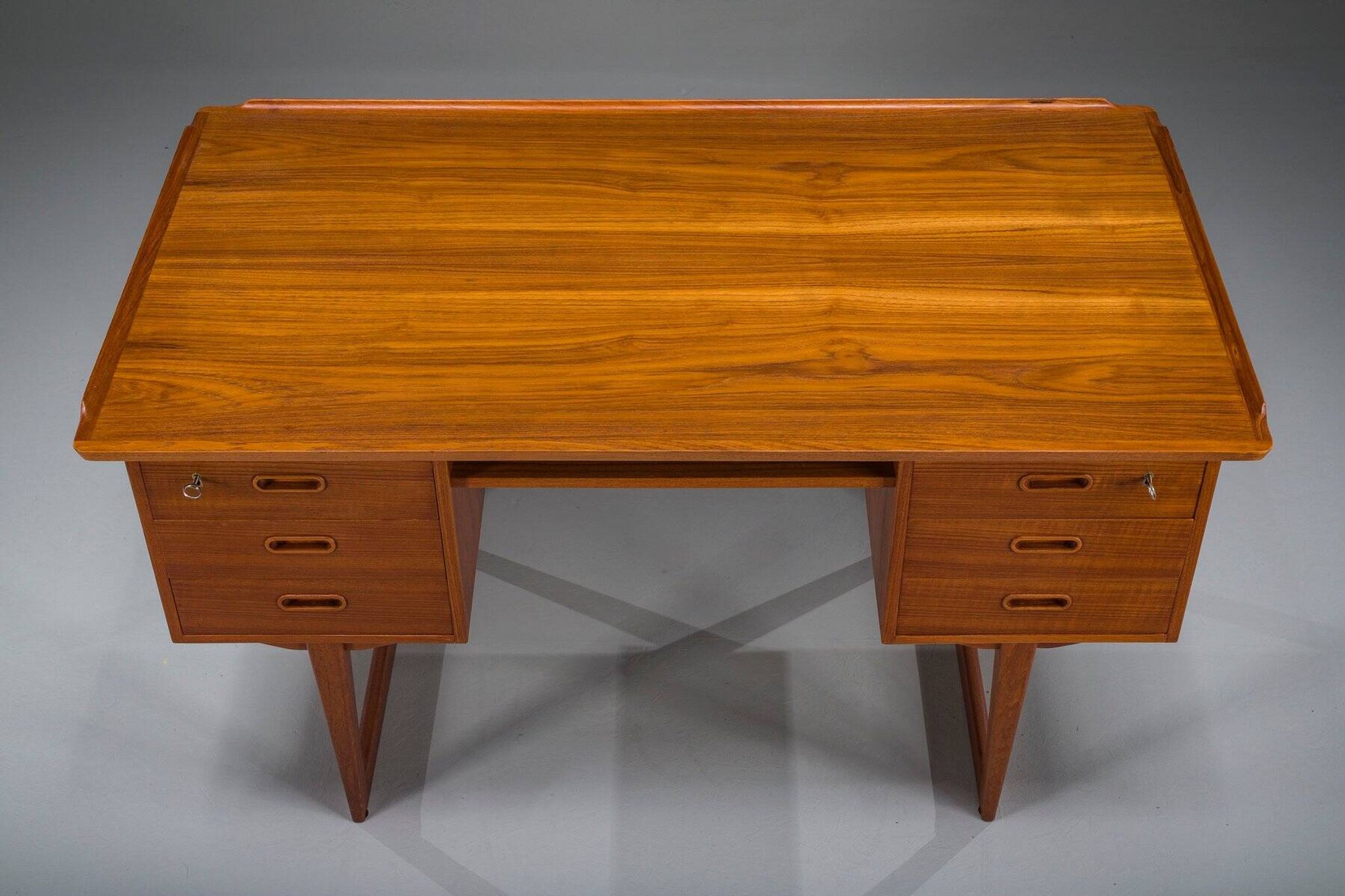Mid-century Danish freestanding teak desk with raised lip edge, 1960s