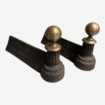 Pair of brass and cast iron ball pegs