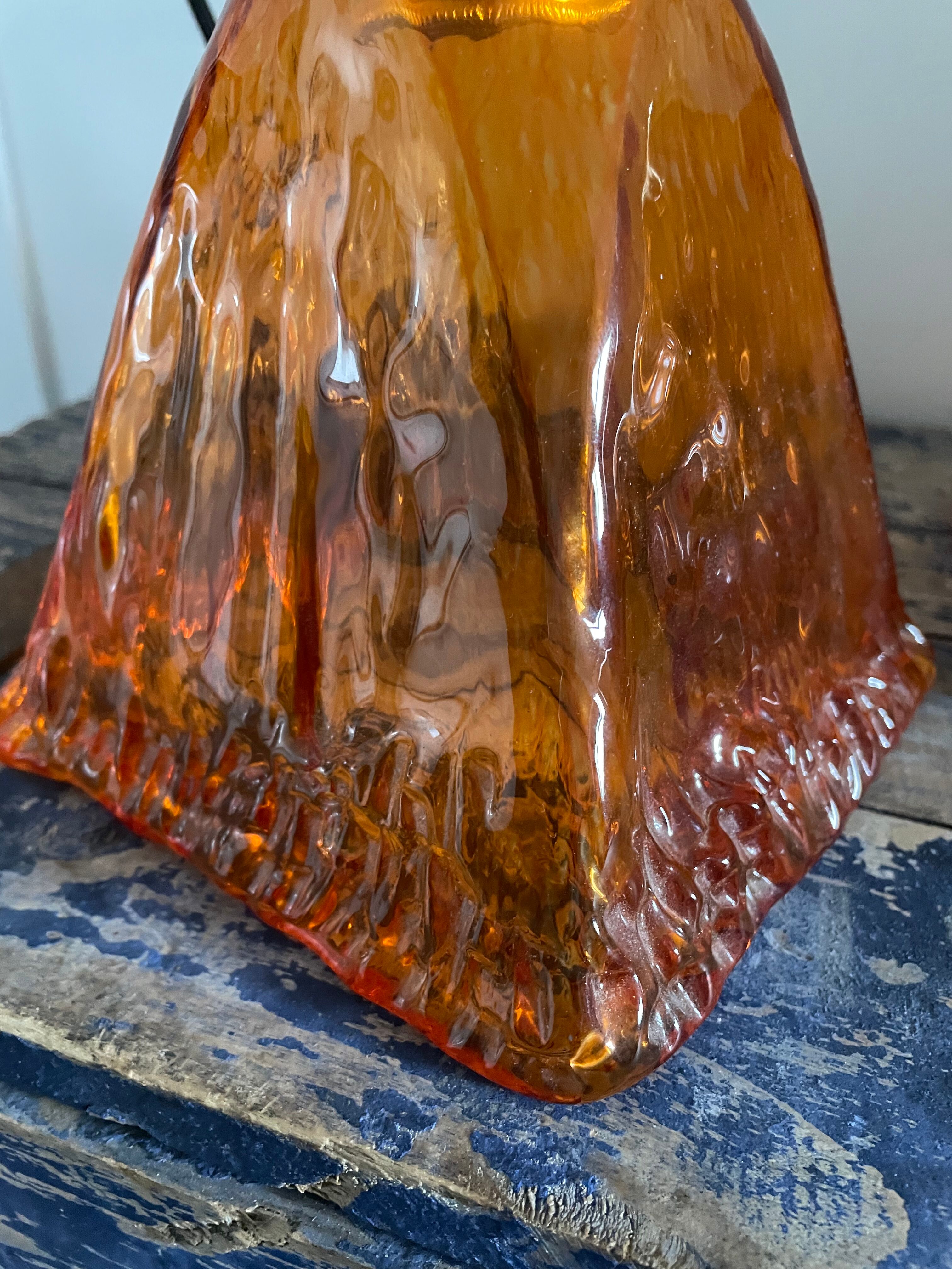 Set of two amber glass hanging lamps