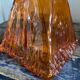 Set of two amber glass hanging lamps