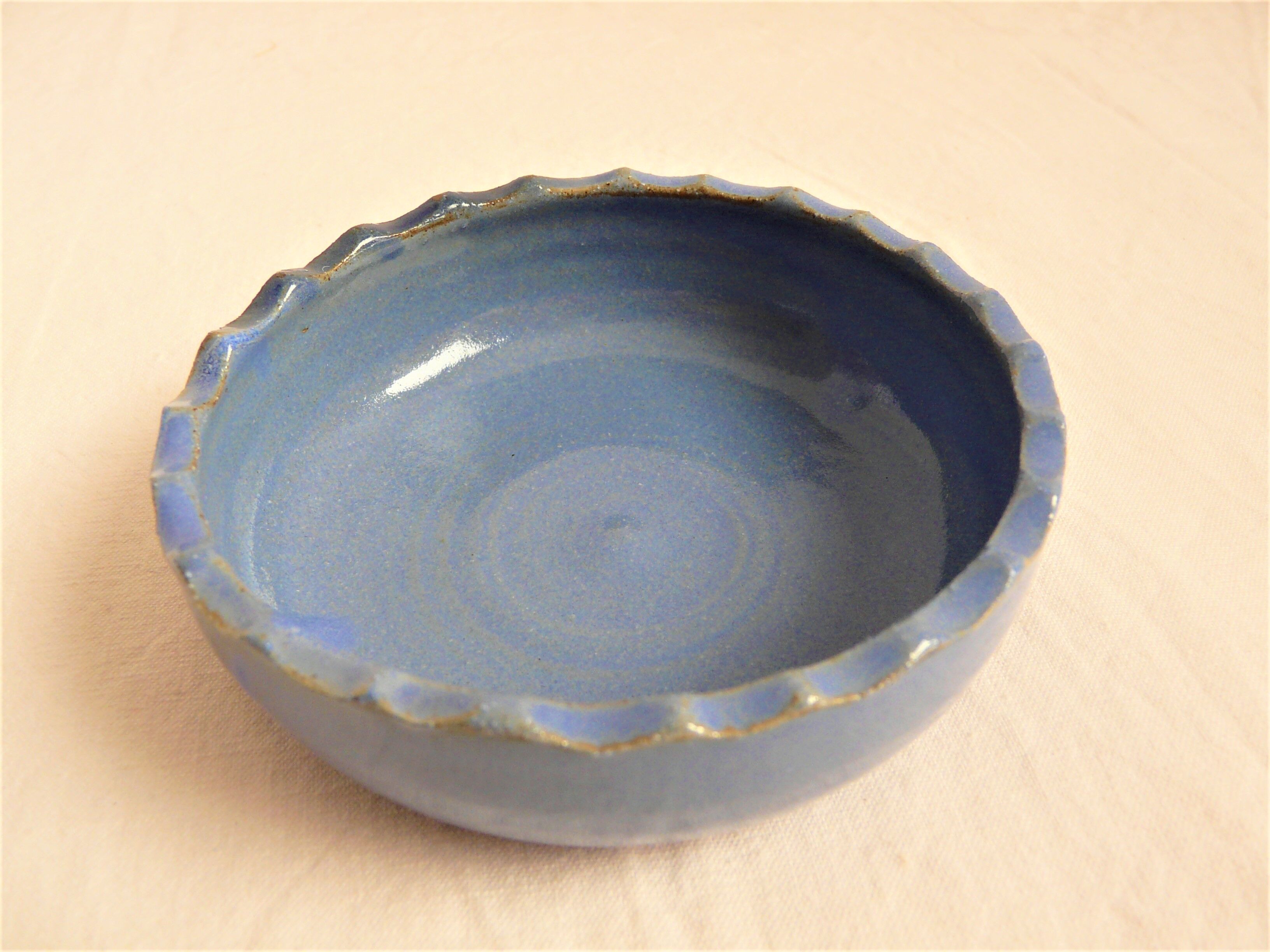 Blue enamelled ceramic cup