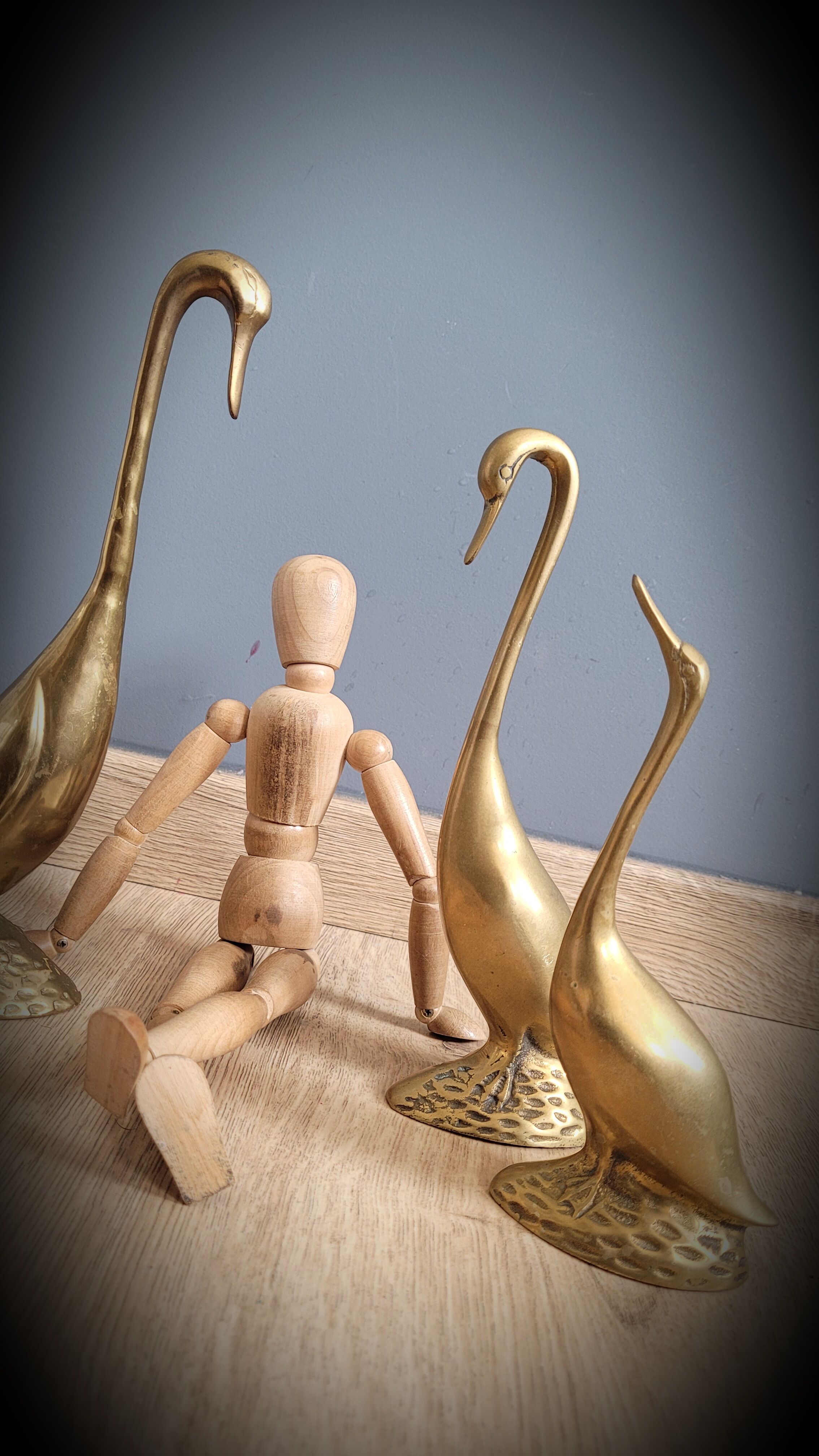 Trio of brass geese