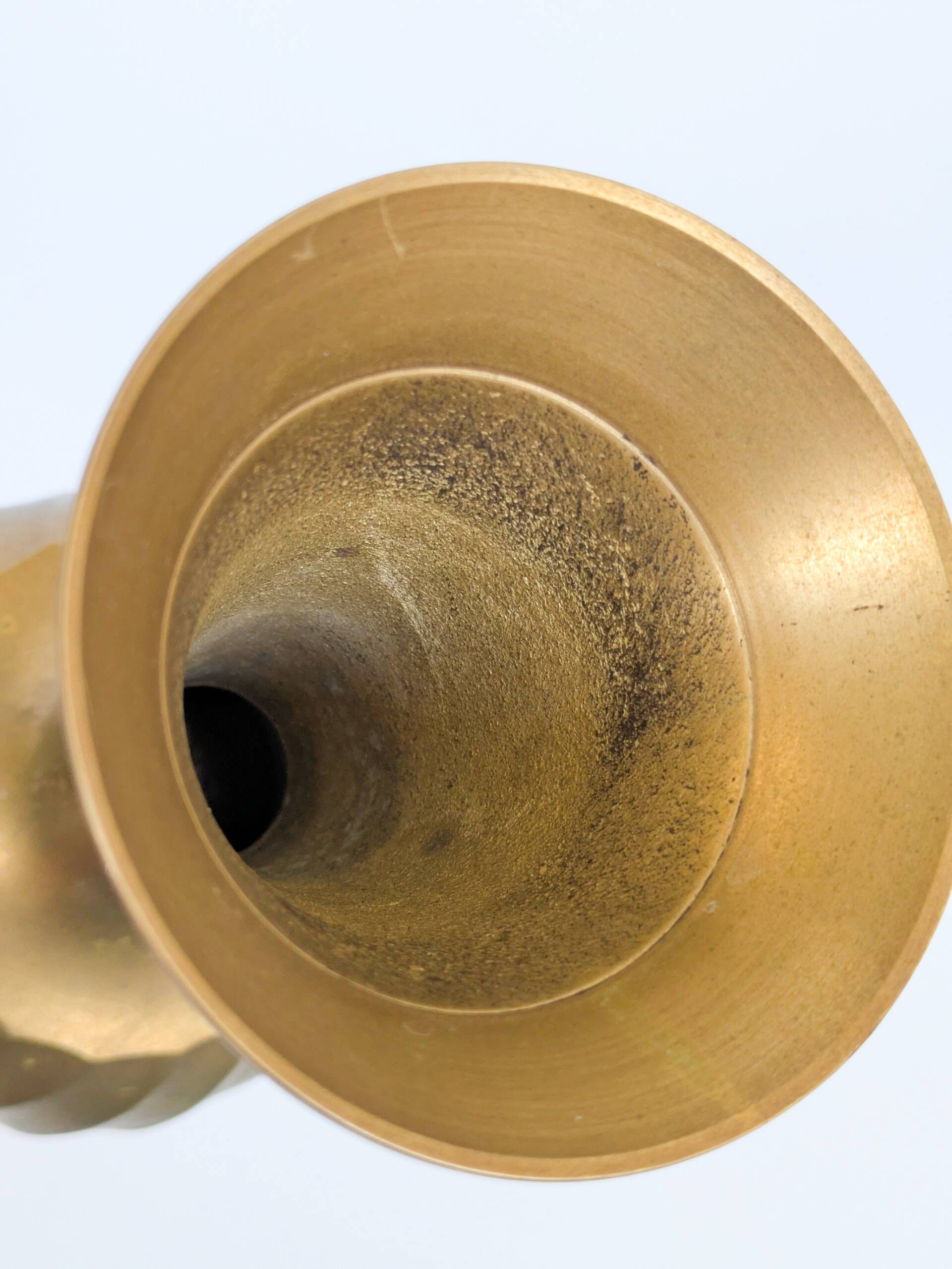 Solid brass Midcentury vase in trumpet shape with twisted details.