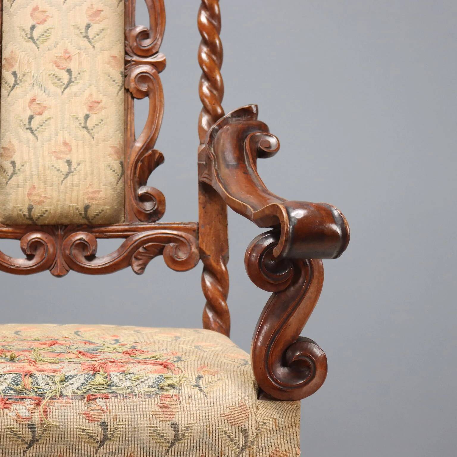 Pair of antique Baroque armchairs in walnut and fabric, Italy, 17th century.